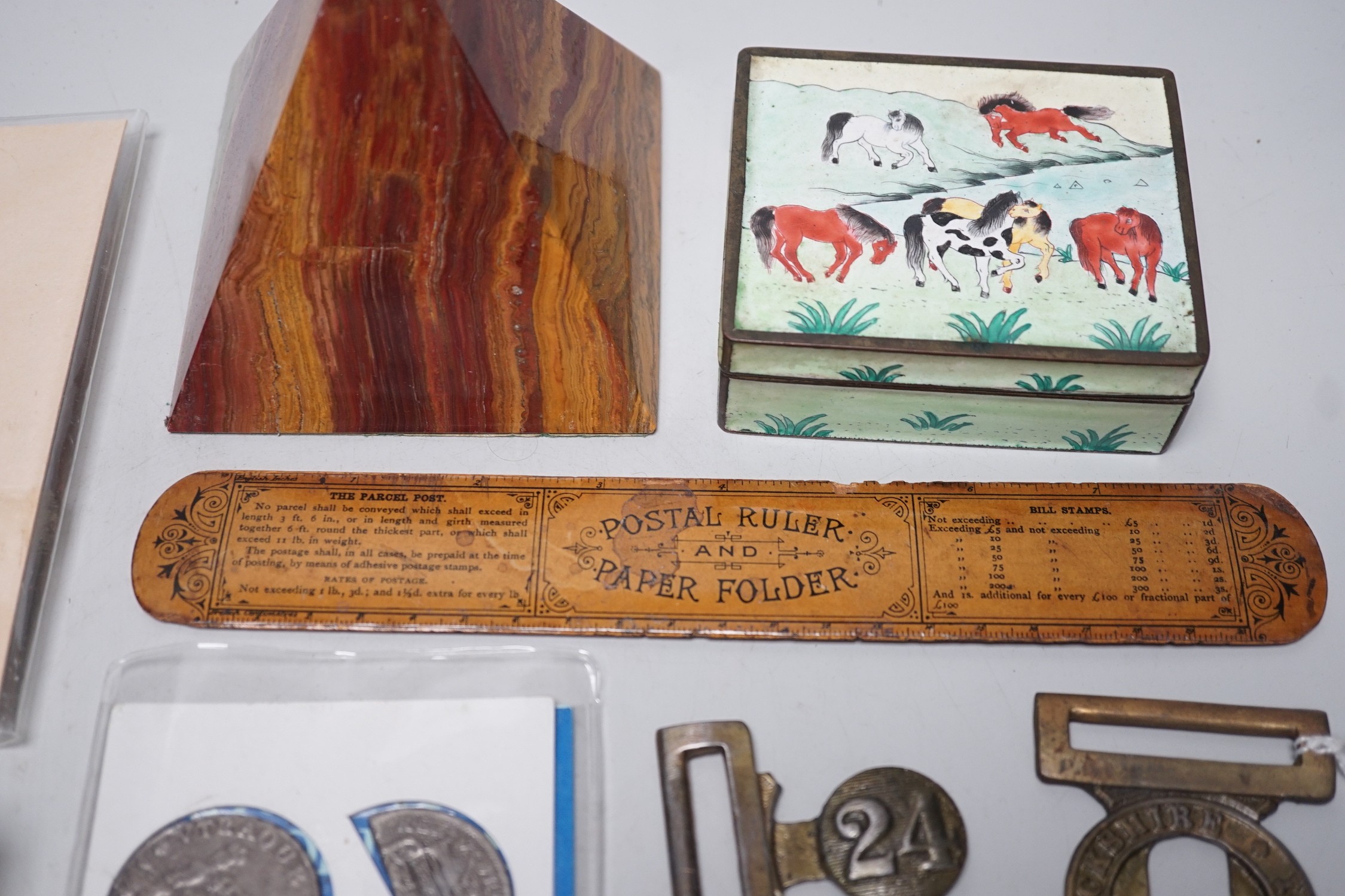 A collection of collectibles: a mother of pearl carves fish, a Mauchlin postal ruler, an enamel box and trays, coinage and various military badges etc